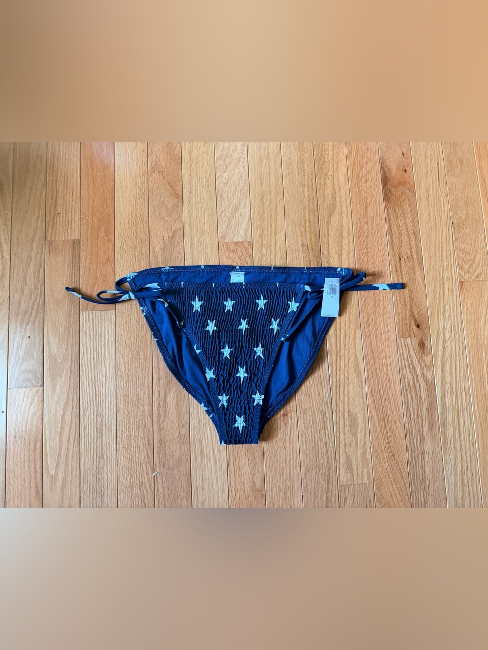 Old Navy NWT blue bikini bottom with white stars, size M. #laborday #america